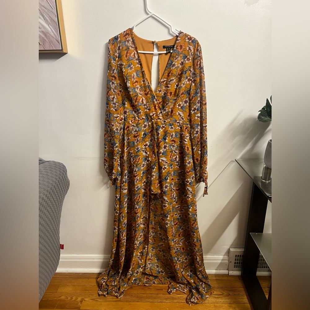 Long sleeve orange dress.